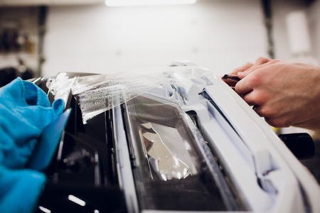 Car paint protection, protect coating installation carving knifeの写真素材
