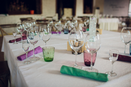 Empty glasses set in restaurant. Part of interior.の写真素材