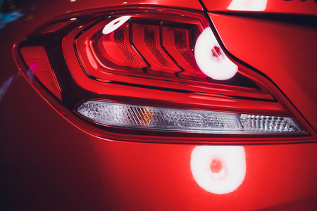 Car detailing series: Closeup of red car taillightsの写真素材