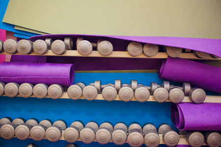 dumbbell, barbell. Background of many color weightsの写真素材