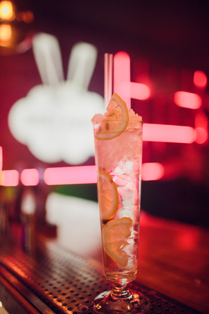 Glasses of cocktails on bar background color drinkの写真素材