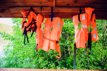 many life vests on the pier. on sunset.の写真素材