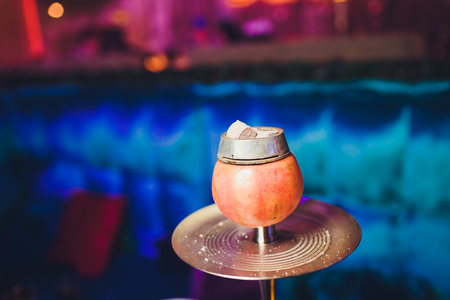 flavored hookah tobacco and fruit, a bowl of grapefruitの写真素材