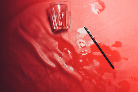 Red spot from leaked fallen wine glassの写真素材