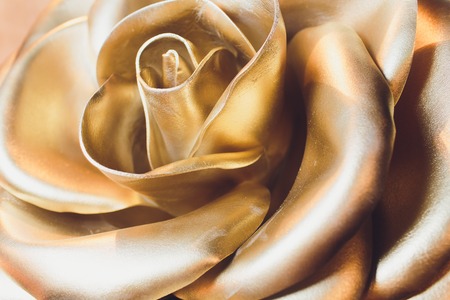 Amazing gold rose isolated. Golden Rose is a gold ornament, which popes of the Catholic Church have traditionally blessed annuallyの写真素材
