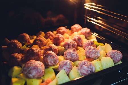 Baked potato gratin with minced meat uncooked. Homemade potato gratin.の写真素材