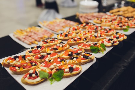 a lot of cold snacks on buffet table, cateringの写真素材