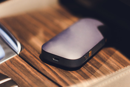 Newest electronic cigarettes, heating tobacco system IQOS, smokingの写真素材