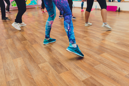 fitness, sport, training, gym and lifestyle concept - group of women working out in gymの写真素材