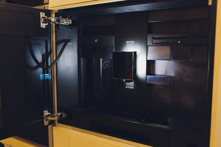 Contemporary kitchen with built in coffee machine.の写真素材