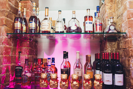 Ufa, Russia, Darling Bar, 20 November, 2018: Editorial image of some alcohol bottles in a row, displayed in a pub or restaurant.のeditorial素材