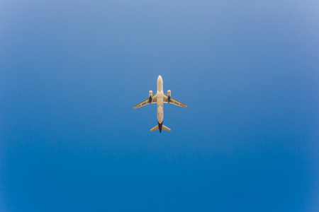 BANGKOK, THAILAND- 25 October 2018 : Ant eye view of Airasia take off on sky position in bottom left corner.のeditorial素材