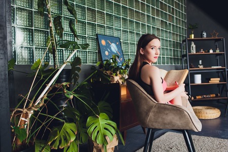 Young beautiful sexy woman in red body.の写真素材