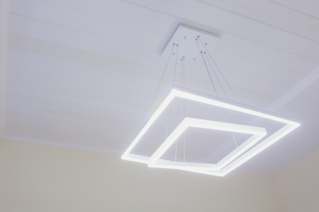 Modern Pendant light lamp illuminated, Elegant Chandelier illuminated.の写真素材