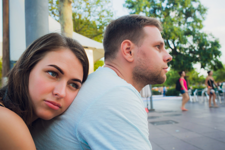 Young couple in love. Thinking about their problems.