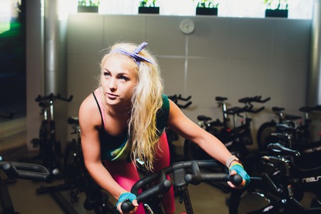 Prertty sporty girl workout in the gym.の写真素材