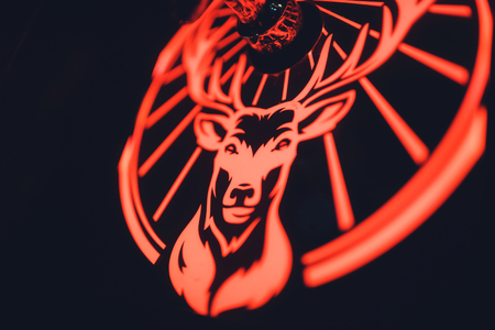 Ufa, Russia, HARATS PUB, 12 December, 2018: Jagermeister alcohol drinks in bar. bartender pours a glass.のeditorial素材