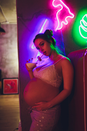 Happy Attractive pregnant woman Concepts of pregnancy and family.の写真素材