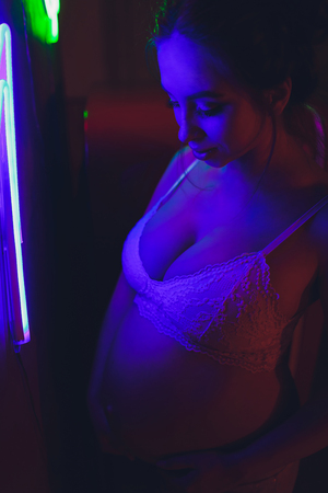 Happy Attractive pregnant woman Concepts of pregnancy and family.の写真素材