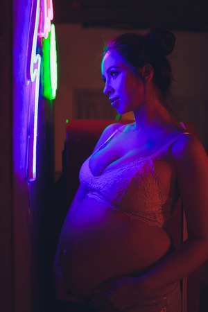 Happy Attractive pregnant woman Concepts of pregnancy and family.の写真素材