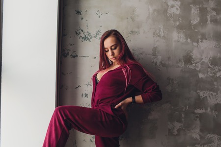 Lingerie and nightwear. Beautiful girl in red nightgown.の写真素材