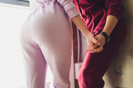 Closeup of two young women in love.の写真素材