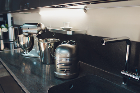 disassembled multifunctional food processor on kitchen countertopsの写真素材