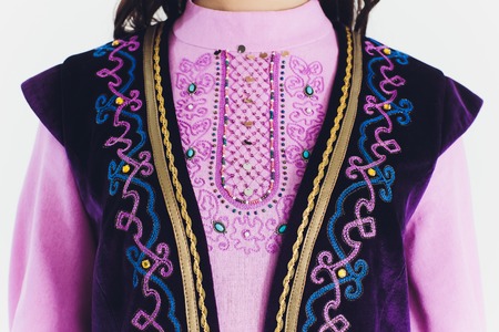 national Bashkir costumes. peoples of Russia. Tatars on white background studio.