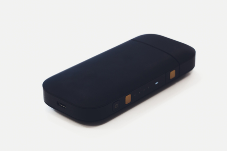 Newest electronic cigarettes, heating tobacco system IQOS, smoking.