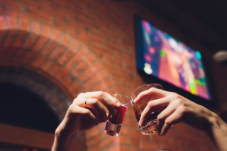 Champagne glasses in hands of people at party.の写真素材