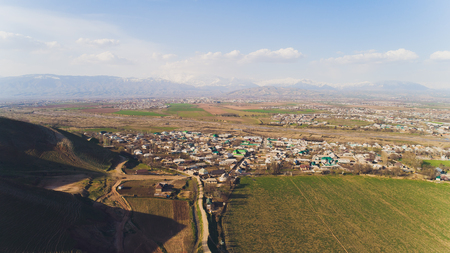 Mountain village at the Fann foothills. Authentic traditional village in the bottom of a valley in summer, Tajikistan, Central Asia.の写真素材