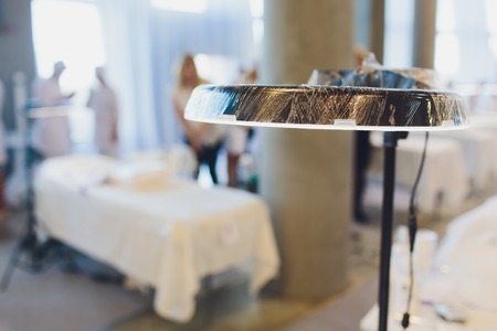 cosmetologists office many couches in the background.の写真素材