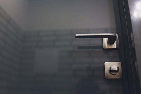 Exterior door handle and Security lock on Metal frameの写真素材