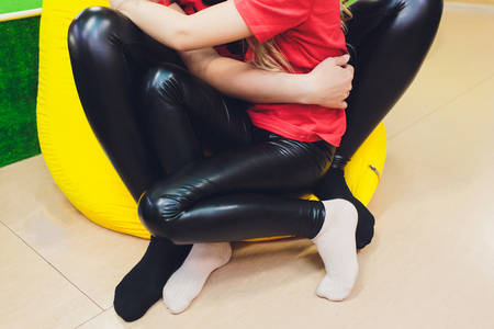 A mother and her teenage daughter hugging.の写真素材