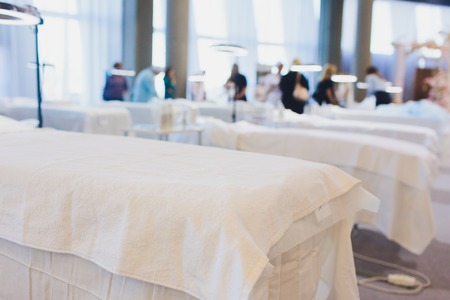 cosmetologists office many couches in the background.の写真素材