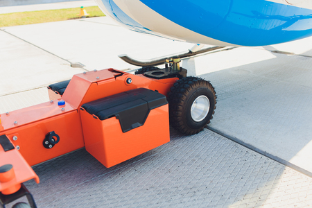 Tow bar for airplane in the airportの写真素材