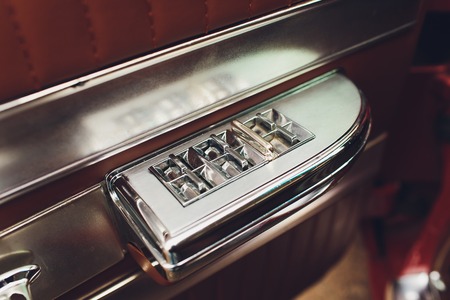 The buttons and levers on the dashboard vintage car