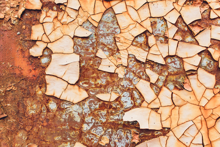 Rusted white painted metal wall. Rusty metal background with streaks of rust. Rust stains. The metal surface rusted spots.metal rust texture backgroundの写真素材