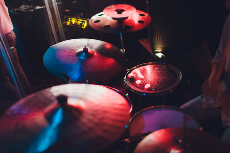 Drum kit on stage in the spotlight colorの写真素材