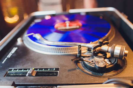 Turntable vinyl record player. Sound technology for DJ to mix play music. Vintage vinyl record...