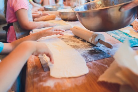 Children's master class in cooking pizza flourの写真素材