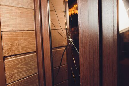 Broken glass black door of the shop.の写真素材