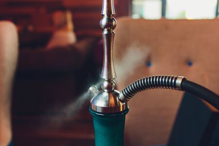 Part of a hookah in the arabic restaurant.