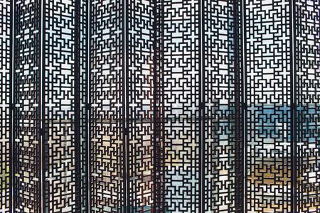 Wooden shutters blinds Windows blinds with the light sunshine.