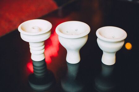 part of the hookah, modern design, on a brick background.