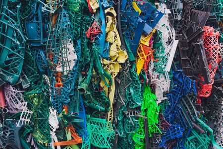 Plastic pressed bales at the modern waste hazardous processing plant. Separate garbage collection. Recycling and storage of waste for further disposal. Business for sorting and processing of waste.の写真素材