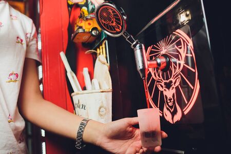 Ufa, Russia, HARATS PUB, 5 November, 2018: Jagermeister alcohol drinks in bar. bartender pours a...