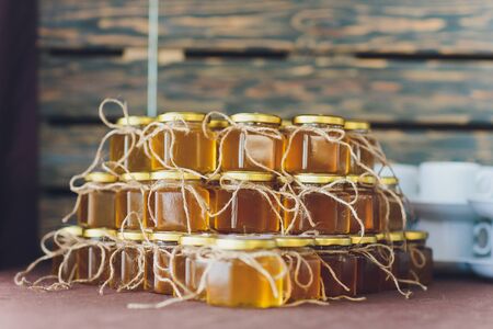 Different small jars of honey lavender honey.の写真素材