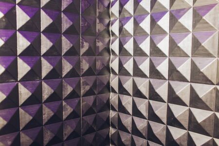 concrete wall texture stucco cement white and gray geometric seamless triangle pyramid background with shadow and light.の写真素材