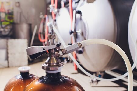 Craft beer brewing equipment in brewery Metal tanks, alcoholic drink production.の写真素材